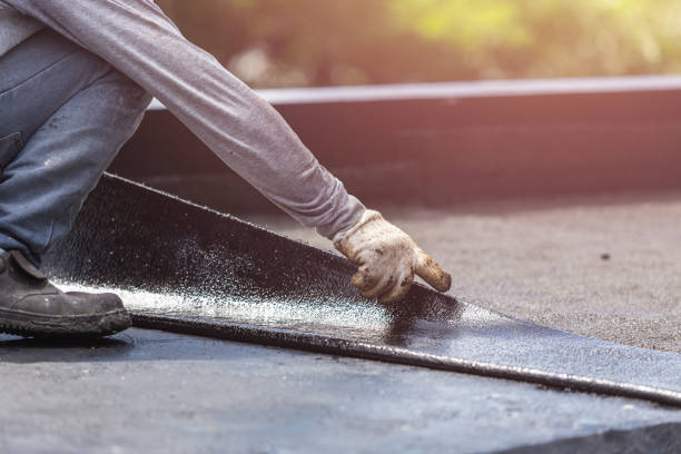 Professional Waterproofing technician working in Harrison, NJ